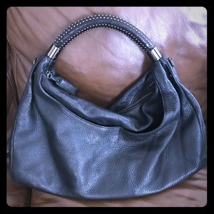 Studded handle handbag